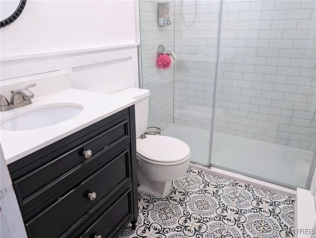 343 Carrollwood Dr, Porter, NY 14174 - bathroom featuring toilet, a tile shower, and vanity