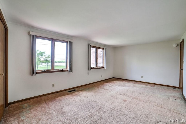 2227 W River Rd, Grand Island, NY 14072 - carpeted empty room featuring baseboards