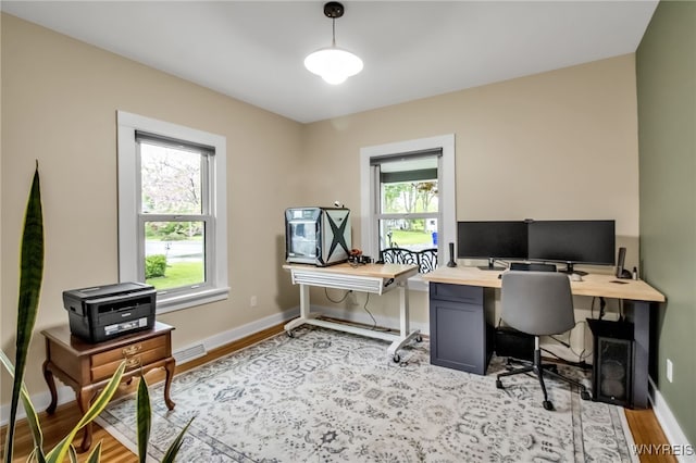 5870 Goodrich Rd, Clarence, NY 14032 - office area featuring light wood-style flooring and baseboards