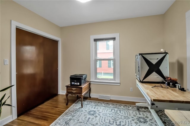 5870 Goodrich Rd, Clarence, NY 14032 - office featuring wood finished floors and baseboards