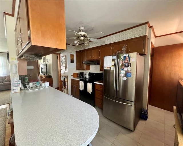 8 Birch St, Oneonta-City, NY 13820 - kitchen featuring freestanding refrigerator, black / electric stove, under cabinet range hood, ceiling fan, and light tile patterned floors