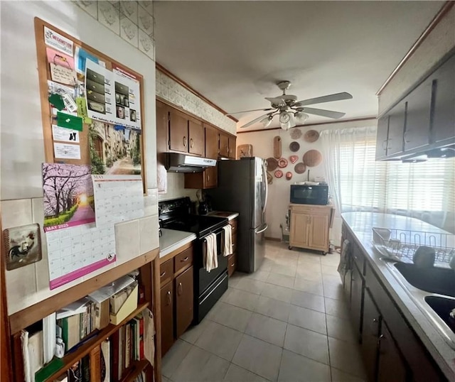 8 Birch St, Oneonta-City, NY 13820 - kitchen with black / electric stove, ceiling fan, light tile patterned floors, light countertops, and ornamental molding