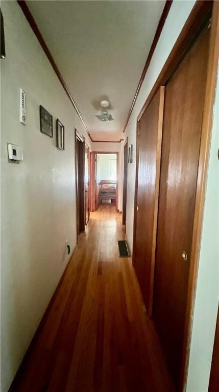 8 Birch St, Oneonta-City, NY 13820 - hall featuring wood finished floors and crown molding