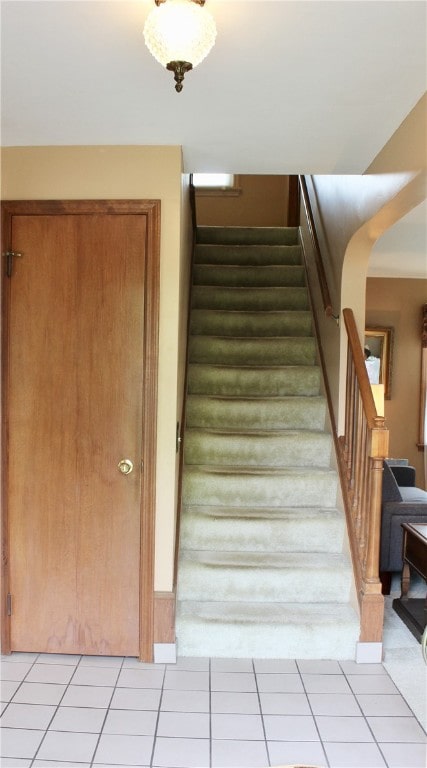 311 N Rogers Pkwy W, Irondequoit, NY 14617 - stairway with tile patterned flooring