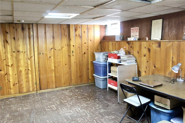 311 N Rogers Pkwy W, Irondequoit, NY 14617 - below grade area featuring tile patterned floors, wood walls, and a drop ceiling