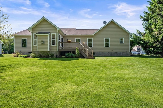 1401 Mountain Laurel Ln, Ontario, NY 14519 - rear view of property with a deck, a lawn, stairway, and crawl space