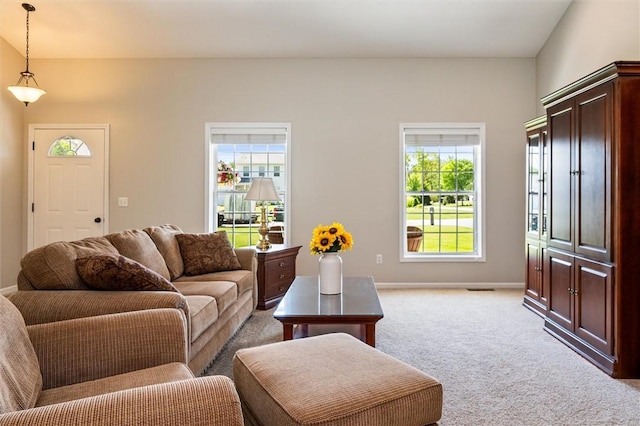 1401 Mountain Laurel Ln, Ontario, NY 14519 - living room with light carpet and baseboards
