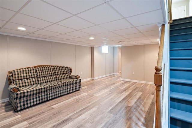 1401 Mountain Laurel Ln, Ontario, NY 14519 - living area with stairway, wood finished floors, recessed lighting, baseboards, and a paneled ceiling