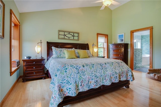 160 Reiss Rd, Otsego, NY 13326 - bedroom featuring light wood-style floors, baseboards, high vaulted ceiling, ceiling fan, and ensuite bath