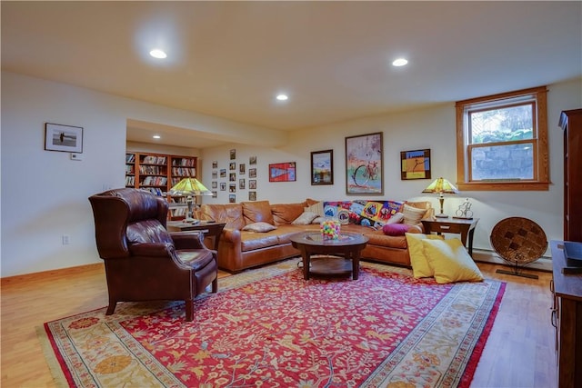 160 Reiss Rd, Otsego, NY 13326 - living area featuring wood finished floors, recessed lighting, and a baseboard radiator