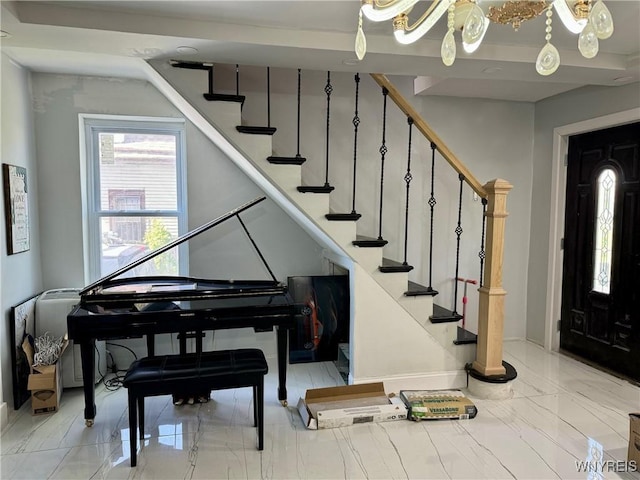 512 Sherman St, Buffalo, NY 14211 - entryway with stairs, baseboards, and light marble finish floors