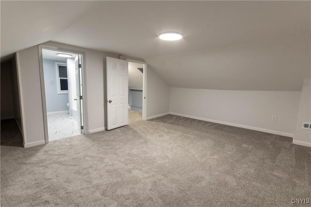 118 Leray St, Le Ray, NY 13612 - additional living space with carpet floors, lofted ceiling, and baseboards