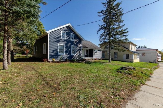 118 Leray St, Le Ray, NY 13612 - view of front facade with a front yard