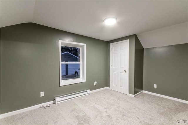 118 Leray St, Le Ray, NY 13612 - additional living space with a baseboard heating unit, lofted ceiling, carpet flooring, and baseboards