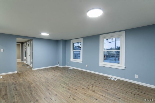 118 Leray St, Le Ray, NY 13612 - unfurnished room featuring baseboards and wood finished floors