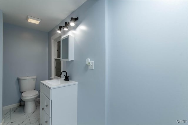 118 Leray St, Le Ray, NY 13612 - half bath with toilet, marble finish floors, vanity, and baseboards