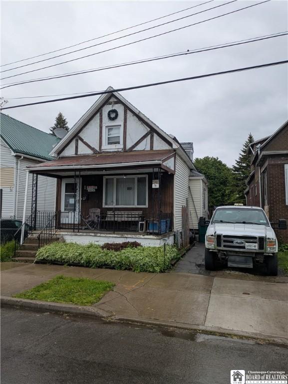 11 Boone St, Buffalo, NY 14220 - english style home with a porch