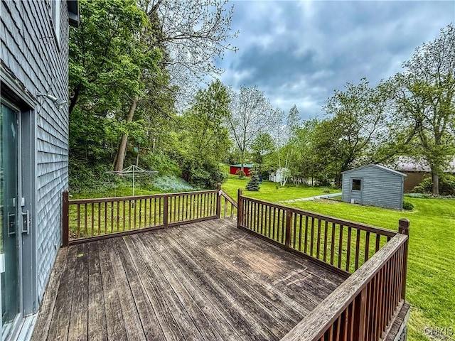 26 Farnham St, Cazenovia, NY 13035 - wooden deck featuring a lawn and an outbuilding