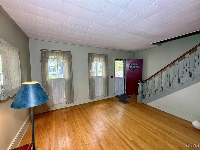 26 Farnham St, Cazenovia, NY 13035 - entryway with wood-type flooring, healthy amount of natural light, baseboards, and stairs
