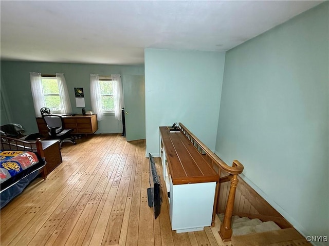 26 Farnham St, Cazenovia, NY 13035 - hallway with light wood-type flooring and an upstairs landing