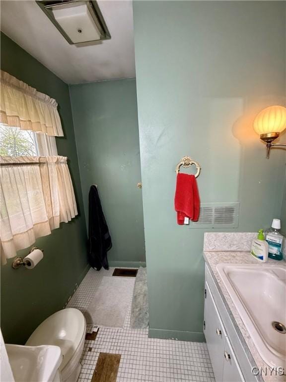 26 Farnham St, Cazenovia, NY 13035 - bathroom featuring vanity and toilet