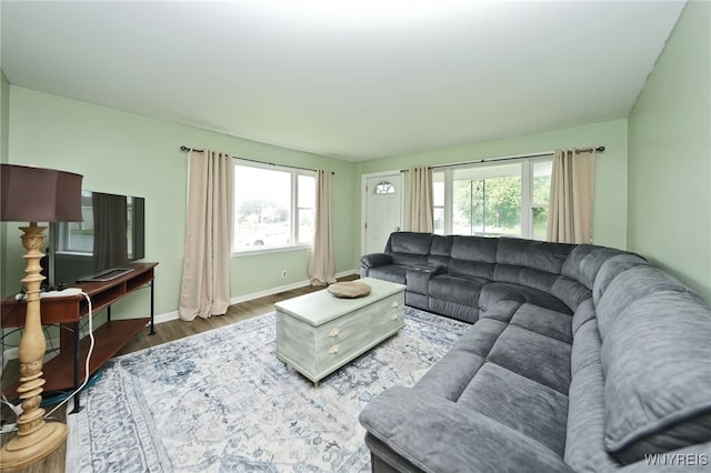 3564 Grafton Ave, Hamburg, NY 14219 - living area featuring wood finished floors, plenty of natural light, and baseboards
