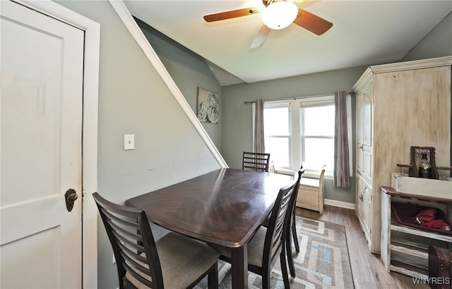 3564 Grafton Ave, Hamburg, NY 14219 - dining room featuring light wood-type flooring, ceiling fan, and baseboards