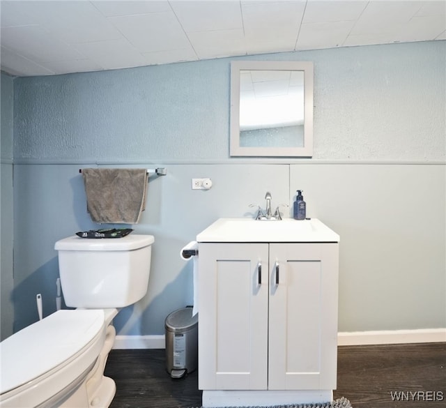 3564 Grafton Ave, Hamburg, NY 14219 - half bath featuring toilet, wood finished floors, and vanity