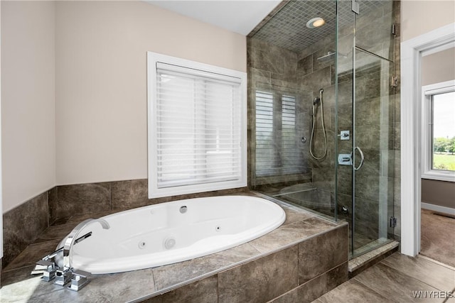 13 Ojibwa Cir, Buffalo, NY 14202 - bathroom featuring a tub with jets, a shower stall, and tile patterned flooring