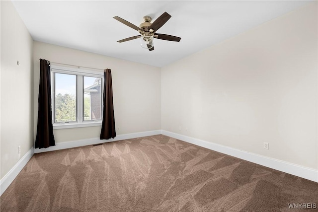 13 Ojibwa Cir, Buffalo, NY 14202 - empty room featuring carpet, baseboards, and a ceiling fan
