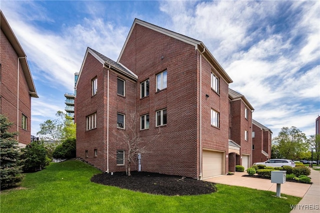 13 Ojibwa Cir, Buffalo, NY 14202 - view of building exterior featuring concrete driveway and a garage