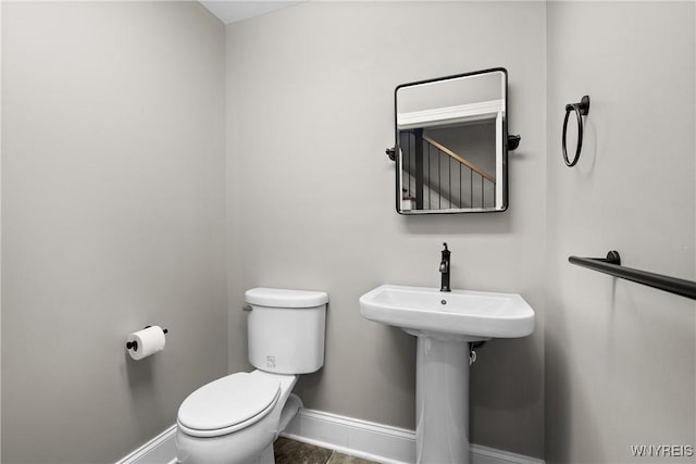 13 Ojibwa Cir, Buffalo, NY 14202 - half bath with baseboards and toilet