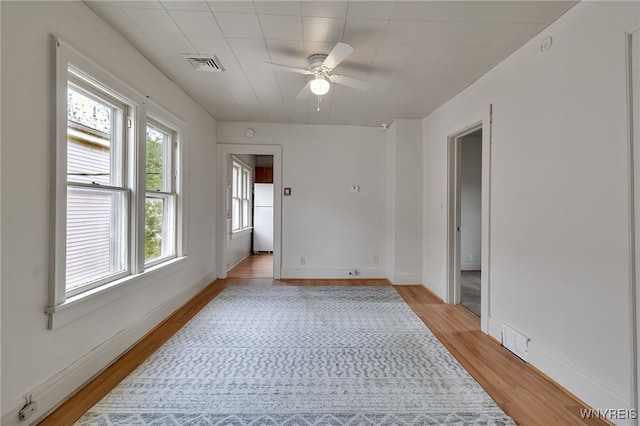 151 Edson St, West Seneca, NY 14210 - spare room with light wood-style floors, ceiling fan, and baseboards