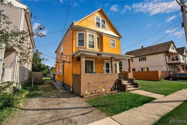 151 Edson St, West Seneca, NY 14210 - view of front facade featuring brick siding, dirt driveway, and covered porch