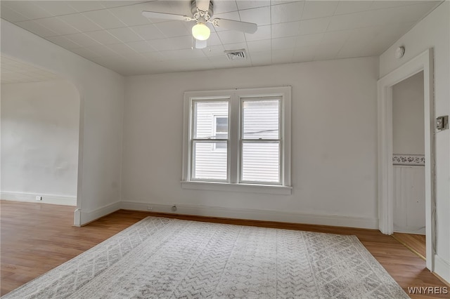 151 Edson St, West Seneca, NY 14210 - spare room with wood finished floors, ceiling fan, and baseboards