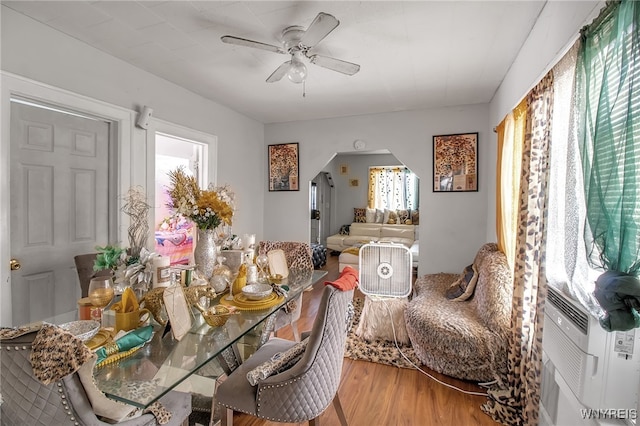 151 Edson St, West Seneca, NY 14210 - dining room with wood finished floors, arched walkways, and ceiling fan
