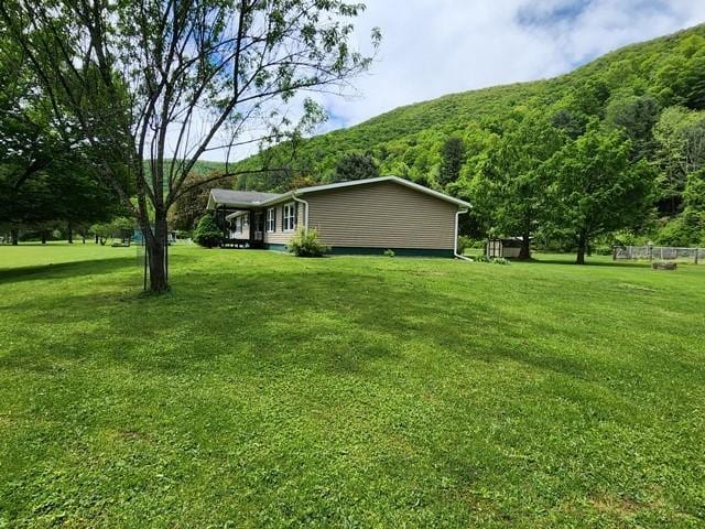 3483 First Fork Rd, Grove Twp, PA 15861 - view of green lawn featuring a mountain view