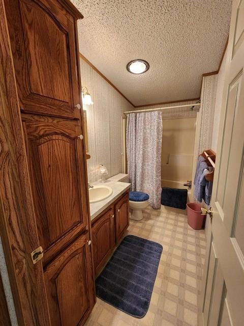 3483 First Fork Rd, Grove Twp, PA 15861 - bathroom featuring crown molding, tile patterned floors, a textured ceiling, vanity, and toilet