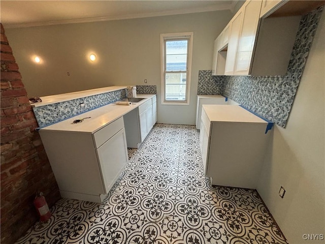 102 Milton Ave, Syracuse, NY 13204 - washroom featuring a sink, crown molding, and light flooring