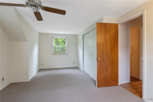 112 Vanida Dr, Camillus, NY 13031 - unfurnished bedroom with light carpet, a closet, a ceiling fan, and baseboards