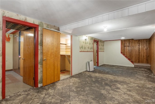 112 Vanida Dr, Camillus, NY 13031 - finished below grade area with stairs, wood walls, baseboards, and tile patterned floors