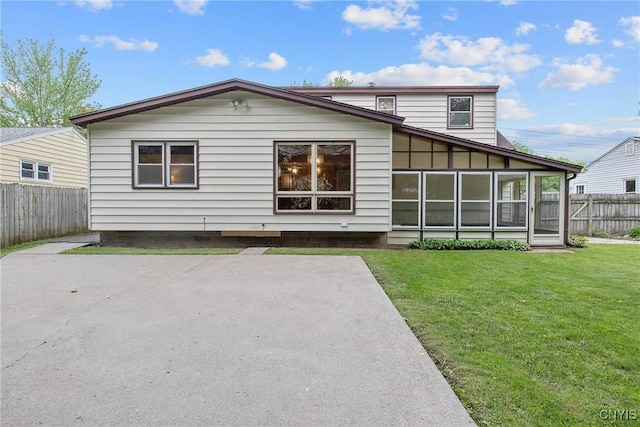 112 Vanida Dr, Camillus, NY 13031 - back of house featuring a sunroom and a patio