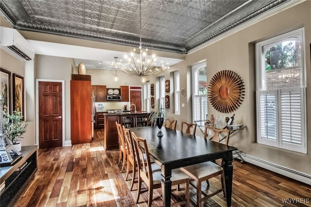 509 Virginia St, Buffalo, NY 14202 - dining area featuring an ornate ceiling, dark wood-type flooring, a wall mounted air conditioner, a chandelier, and ornamental molding