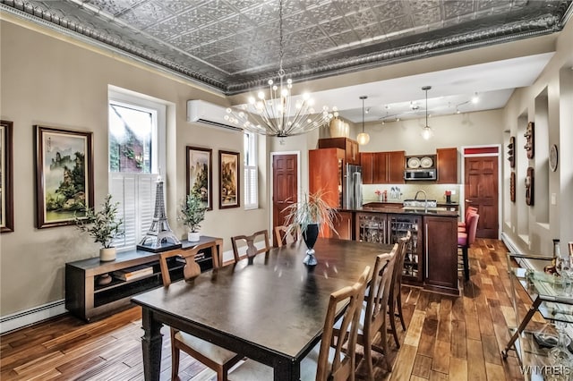 509 Virginia St, Buffalo, NY 14202 - dining area featuring a wall mounted air conditioner, dark wood-style flooring, an ornate ceiling, a chandelier, and baseboard heating