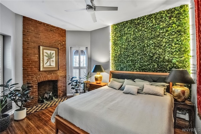 509 Virginia St, Buffalo, NY 14202 - bedroom with dark wood-style floors, a fireplace, and ceiling fan