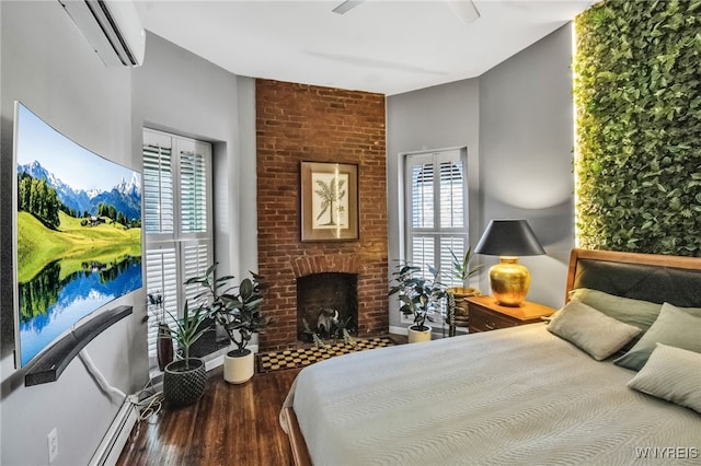 509 Virginia St, Buffalo, NY 14202 - bedroom with a wall mounted AC, wood finished floors, a fireplace, and ceiling fan