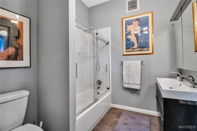 509 Virginia St, Buffalo, NY 14202 - bathroom featuring toilet, baseboards, vanity, and shower / bath combination with glass door