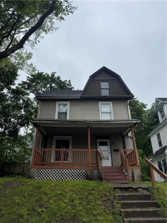 213 Flint St, Rochester, NY 14608 - view of front of property featuring a porch and a gambrel roof