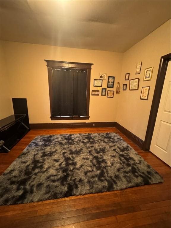 213 Flint St, Rochester, NY 14608 - living area with dark wood finished floors and baseboards