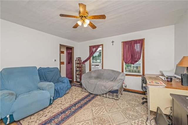 3 Maple St, Lyons, NY 14489 - living area with a ceiling fan, cooling unit, and baseboards